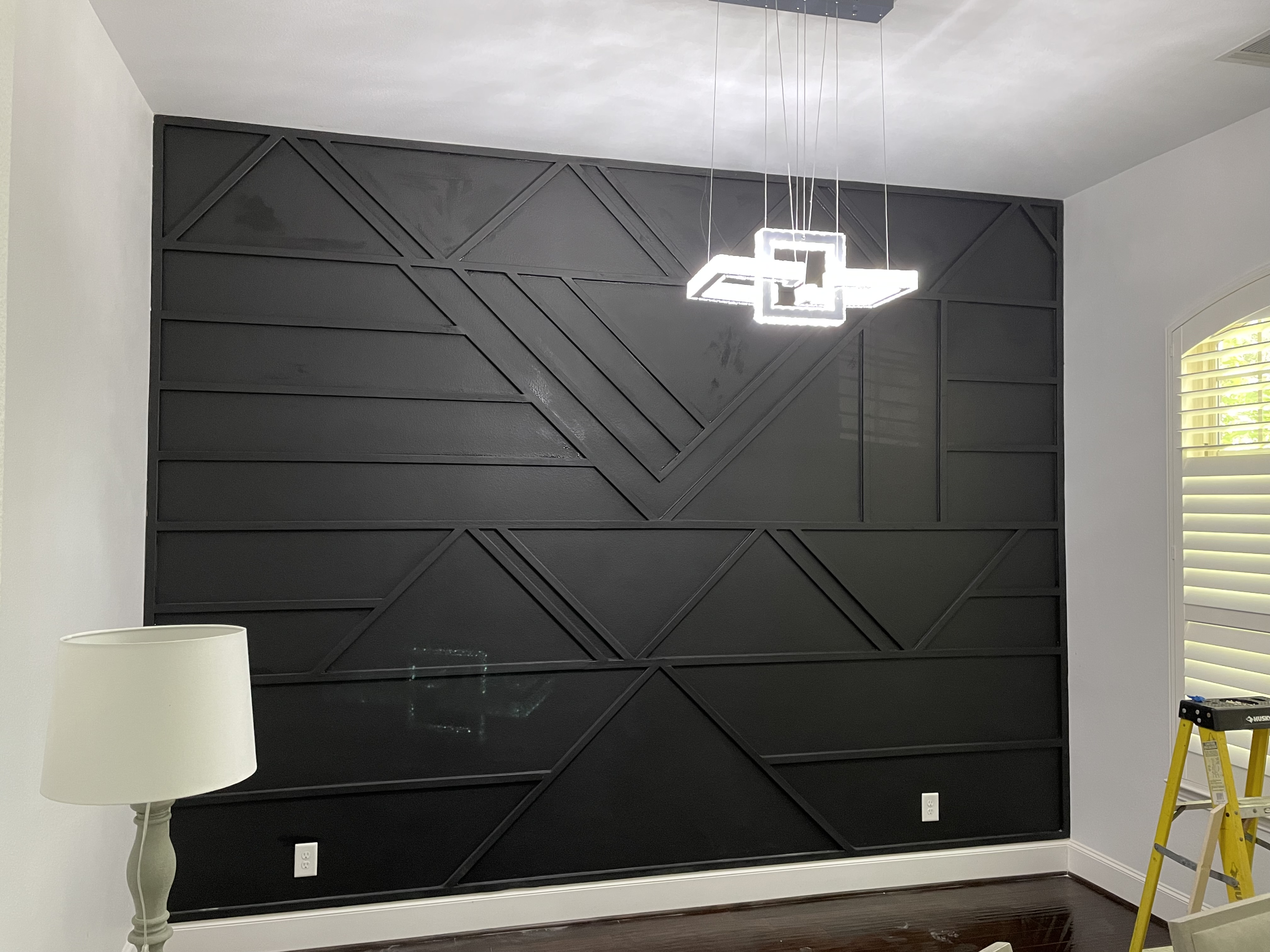 Custom geometric accent wall — OakVera interior finishes