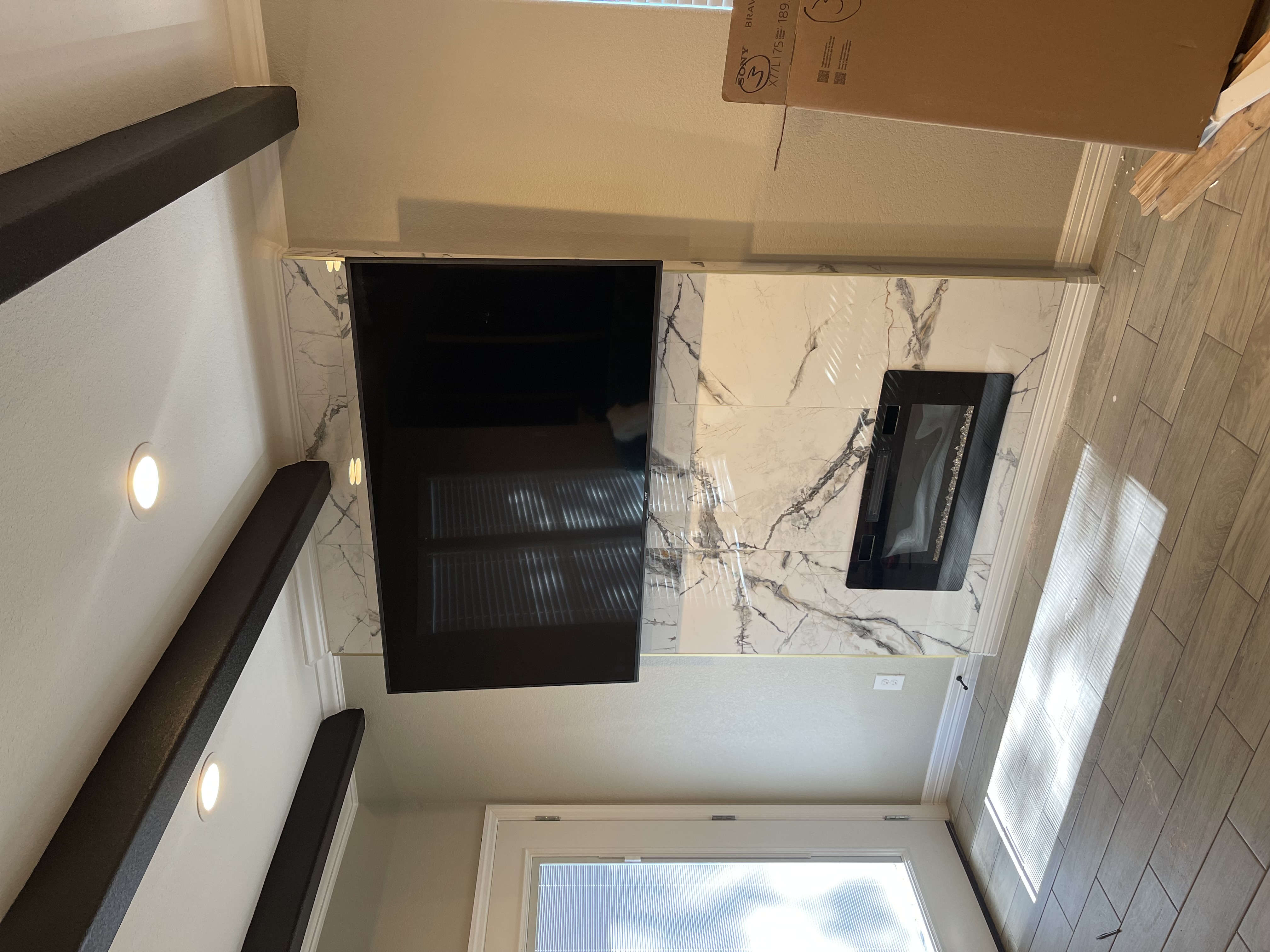 Marble fireplace and tile work — OakVera kitchen remodeling